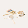 A set of children's musical instruments including a tambourine, mini drum, drumstick, and xylophone with wooden keys, all in a natural wood color.