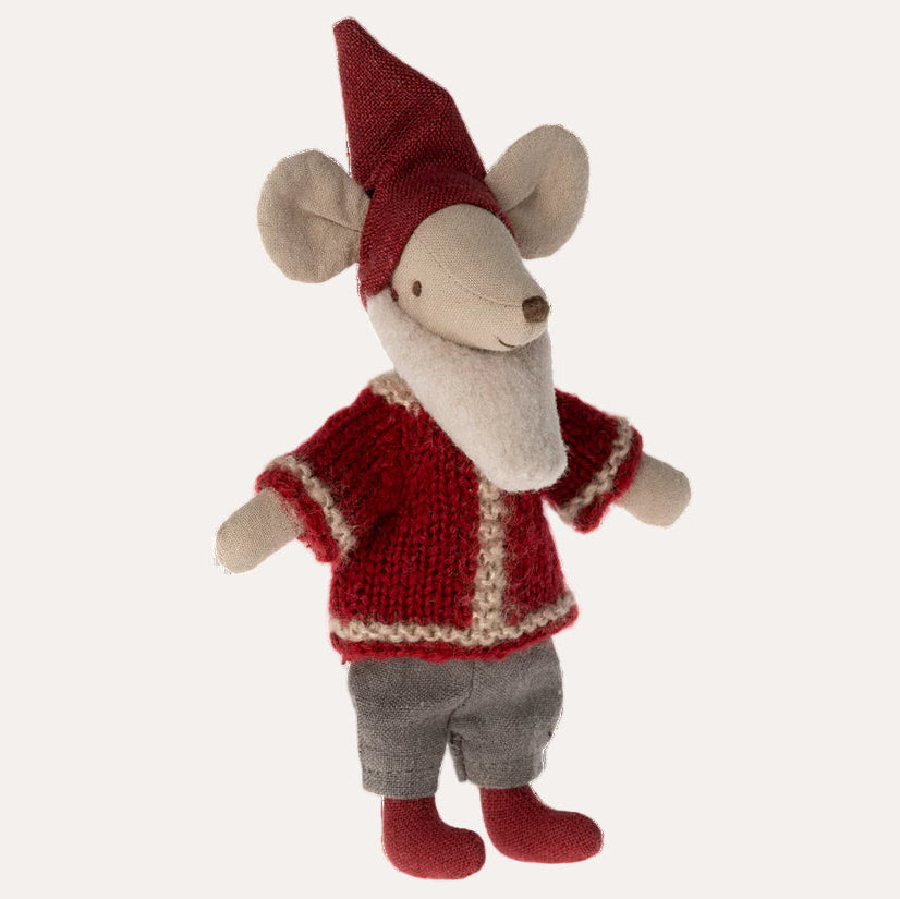Toy mouse dressed in a red outfit with a hat on a white background