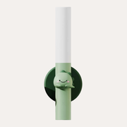 The Zoofamily Dino Zoo Light with a white light tube, green handle and dinosaur detail on a dark green round holder.