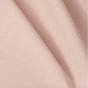 Close-up of Oliver Furniture Mini+ curtain fabric in Rose, showing soft folds in the pale pink material.