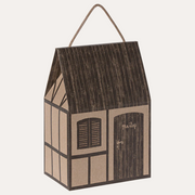 Maileg brown Farmhouse gift bag with a pitched roof shape, cord handle and printed timber-framed house details.