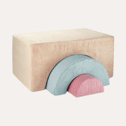 Wigiwama Brown Sugar Rainbow Playset with a beige block and nested blue and pink arches.