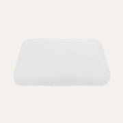 Sebra white baby jersey bedding sheet fitted around a rectangular mattress with rounded corners.