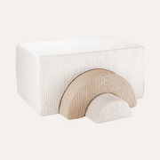 Wigiwama Marshmallow Rainbow Playset with a white block, a beige arch and a white semicircular centre.