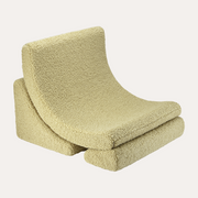 Folded green towel on a white background