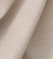 Close-up of Oliver Furniture Classic curtain fabric in Nature, showing beige fabric in soft folds.