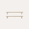 Two light natural wood wall bars with matching wall mounts, shown against a plain white background.