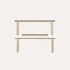A set of three light natural wood mounting brackets or rails, shown against a solid white background.