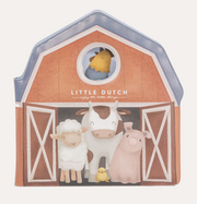 Little Dutch Little Farm Bath Book closed, showing a barn-shaped cover illustrated with farm animals.