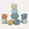 Colorful geometric stacking blocks with 'little dutch' branding on a light gray background
