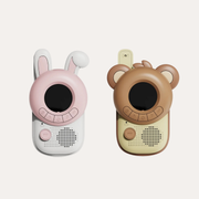 The Zoofamily Rabbit and Bear walkie-talkies side by side with round black screens and pink and brown animal faces.