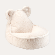 White fleece pet bed with bear ears on a white background