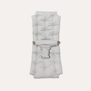 Oliver Furniture Extra Baby Cushion in Grey shown flat, with quilted padding, waist straps and a central fastening.