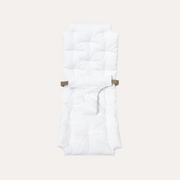 Oliver Furniture Extra Baby Cushion in White shown flat, with quilted padding, waist straps and a central fastening.