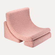 Pink wedge pillow on a white background