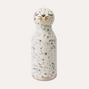 Speckled water bottle with a cat design on a white background