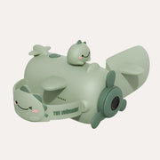 The Zoofamily Dino Zoo Video camcorder with a green plane-shaped body, dinosaur details and propeller-shaped lens surround.