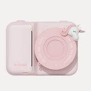 The Zoofamily Unicorn instant print camera in pale pink with a round pink lens cover and white unicorn detail.