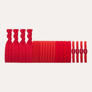 Mimi & Lula Red Mixed Pony Pack arranged in a row with knotted bands, plain elastics and small embellished ties.