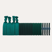 Mimi & Lula Green Mixed Pony Pack arranged in a row with knotted bands, plain elastics and small embellished ties.