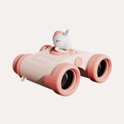 The Zoofamily Unicorn Zoo Eyes binoculars with a pale pink body, deeper pink lens rims and white unicorn figure.