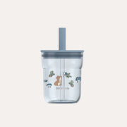 Clear tumbler with a gray lid and animal illustrations on a white background
