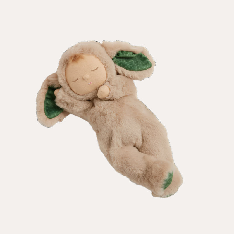 Plush toy resembling a baby in a bunny costume on a white background