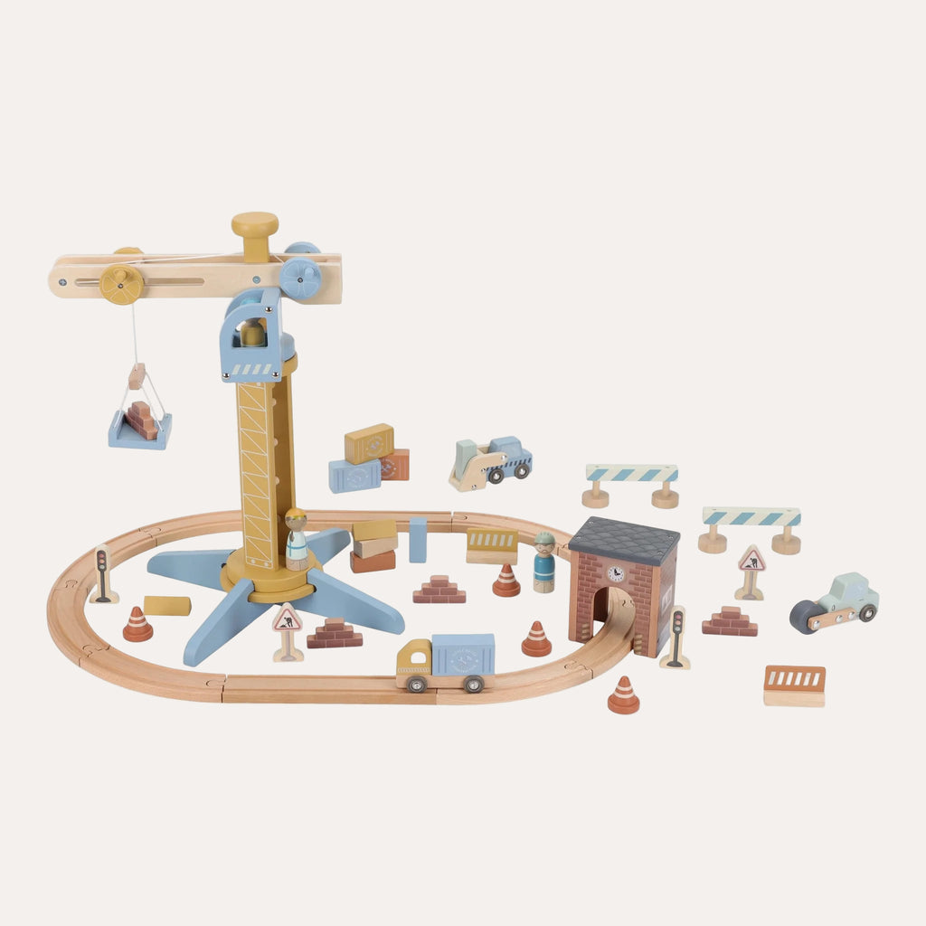 Wooden toy train set with tracks, cars, and various accessories on a white background
