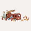 Wooden toy fire truck with accessories on a white background