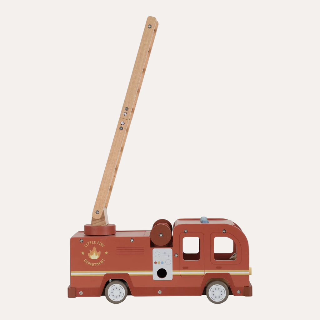 Wooden toy fire truck with a pull handle on a white background