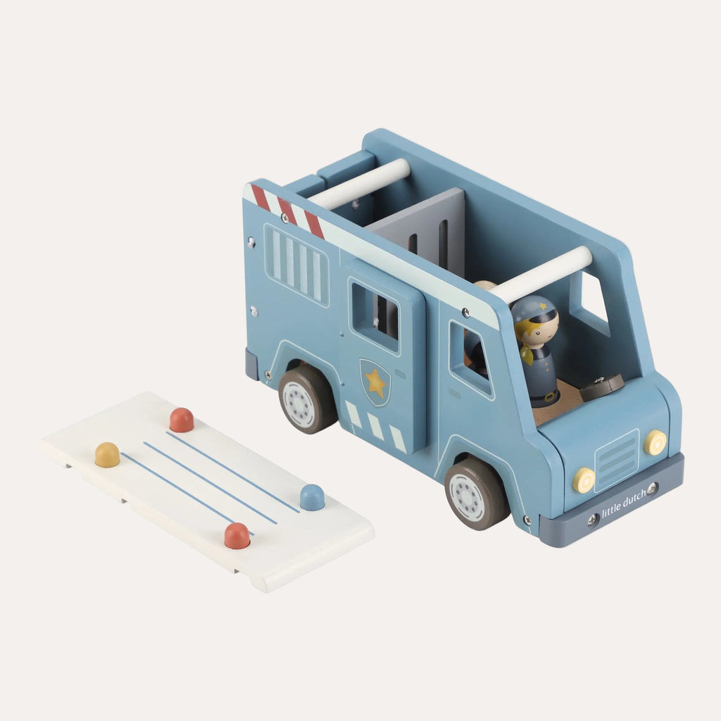 Toy truck with a small figure inside on a white background