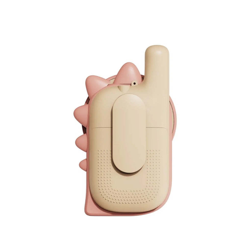 Beige walkie talkie held by a hand on a white background
