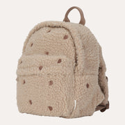 Angled view of the Little Dutch Forest Friends teddy backpack with small brown motifs and a front pocket.